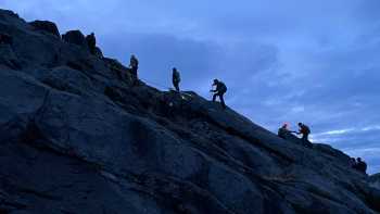 Trekkers on the final push to the summit of Mt Kinabalu