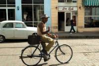 Local Cuban man riding his bike down the street | <i>Vanessa Dean</i>