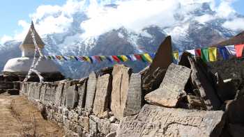 Mani stones that are inscribed with the Buddhist mantra "Om mani padme hum"