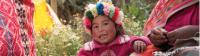 The young children of Huilloc spend the day by their mothers side as she sells her handcrafted weaving products |  <i>Mark Tipple</i>